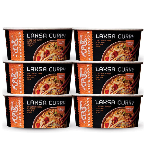 Six Snapdragon 2.1oz Laksa Curry Instant Noodle Bowls are arranged in two stacks of three. Each 6 pack showcases vibrant imagery of coconut curry flavor, inspired by Southeast Asian spices and creamy coconut milk.